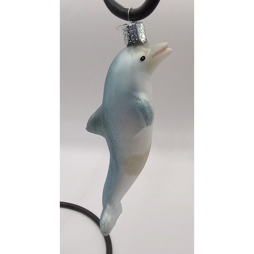 Old world Christmas glass ornament playful dolphin